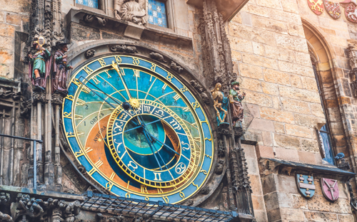 The Astronomical Clock in Prague's Old Town Square - enjoy as part of a solo holiday in Prague